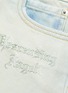 - GROUND ZERO - 'Descending Angel' slogan print asymmetric denim shorts