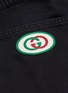  - GUCCI - GG logo appliqué washed denim track shorts