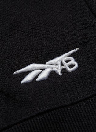 - VICTORIA BECKHAM - x Reebok logo embroidered oversized short sleeve hoodie
