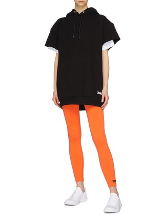 Figure View - Click To Enlarge - VICTORIA BECKHAM - x Reebok logo embroidered oversized short sleeve hoodie
