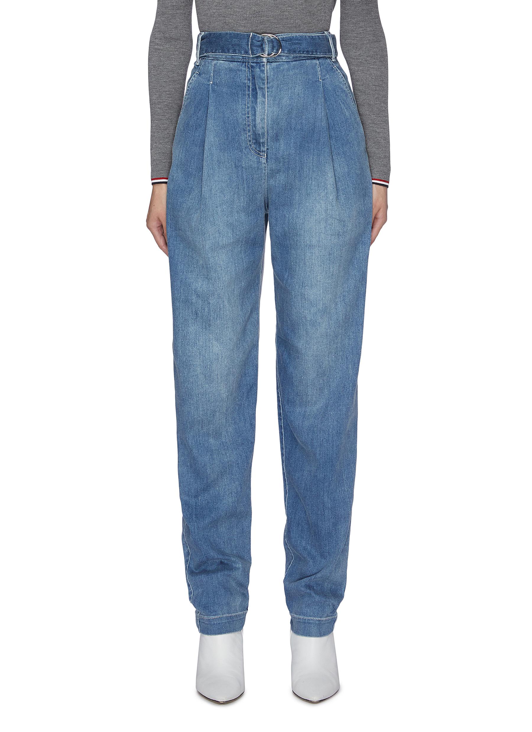 Belted pleated stonewashed jeans by Tibi