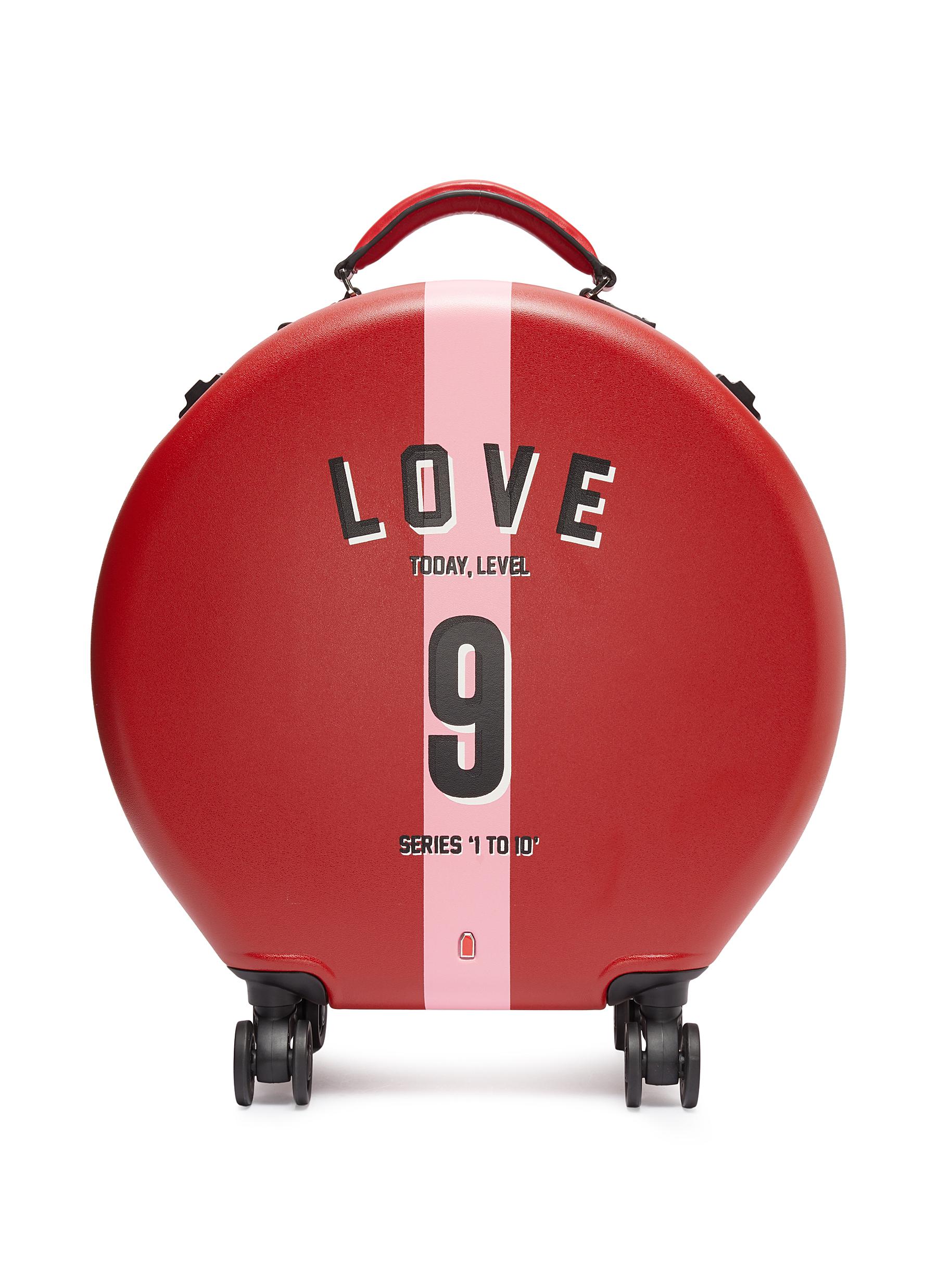 Click to view more detailed imagery on our partner's website Ookonn X Studio Concrete Round Carry-On Spinner Suitcase – 9 Love