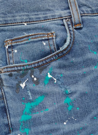  - AMIRI - 'Graffiti' paint splatter print ripped jeans