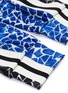  - NORMA KAMALI - Stripe outseam colourblock geometric turtle print track pants