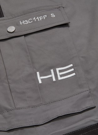  - HELIOT EMIL - Logo embroidered knee patch pants