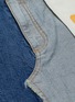 Detail View - Click To Enlarge - MONSE - Fringe hem staggered inside-out denim mini skirt