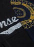  - MONSE - Colourblock logo print asymmetric staggered cold shoulder hoodie