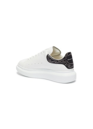  - ALEXANDER MCQUEEN - 'Oversized Sneaker' in leather with flame stud collar