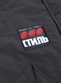  - HERON PRESTON - Cyrillic dot appliqué patch pocket panelled jacket