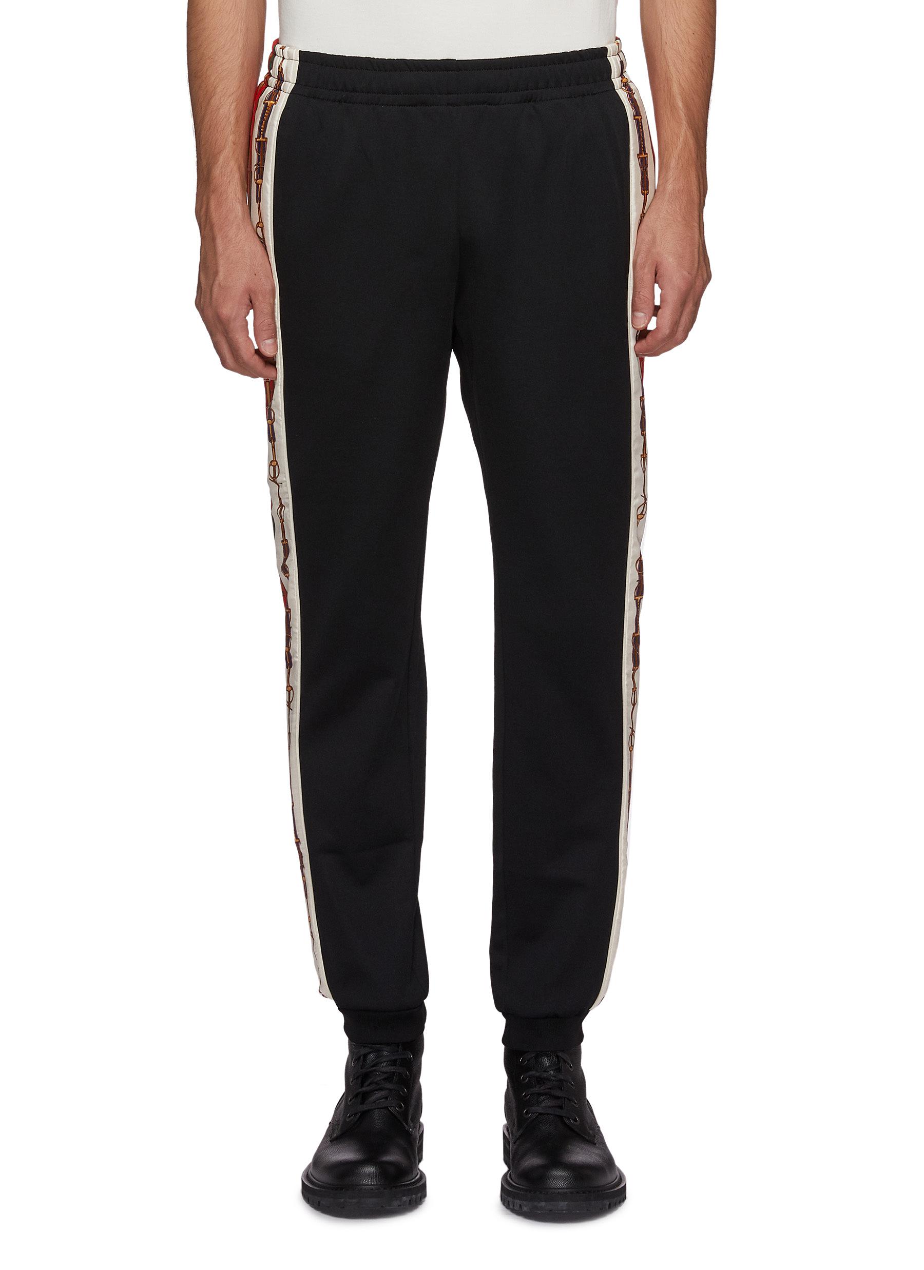 gucci stripe track pants