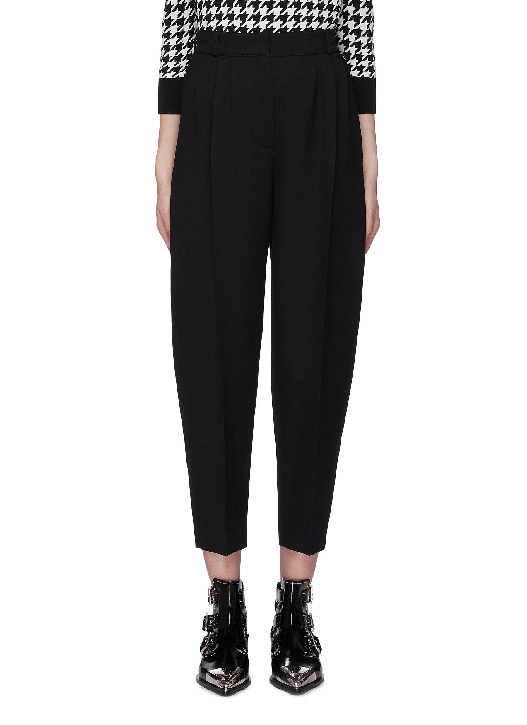 Pleated tapered suiting pants by Alexander Mcqueen