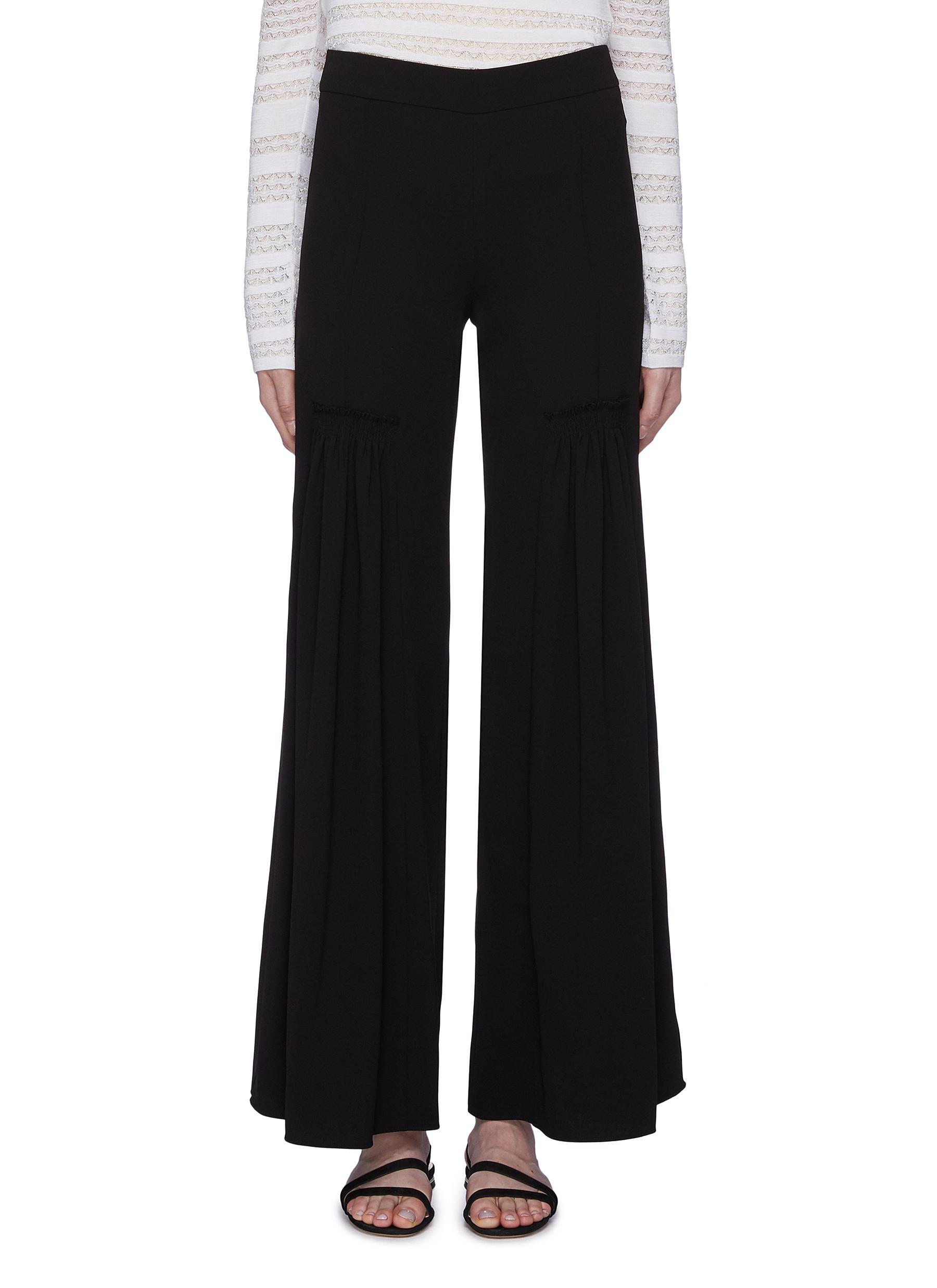 Shirred crepe flared pants by Chloé