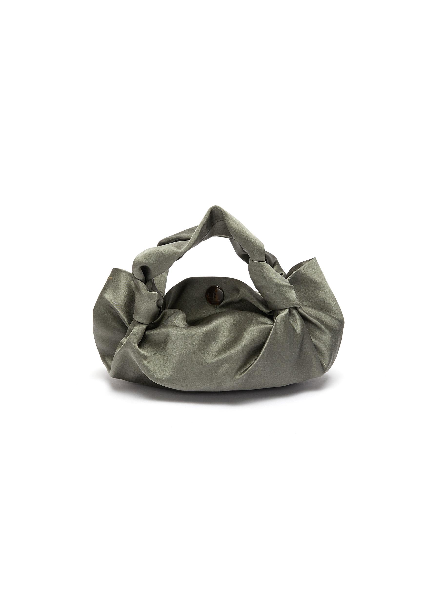 Click to view more detailed imagery on our partner's website The Row 'Ascot Two' Silk-Satin Bag In Pale Sage
