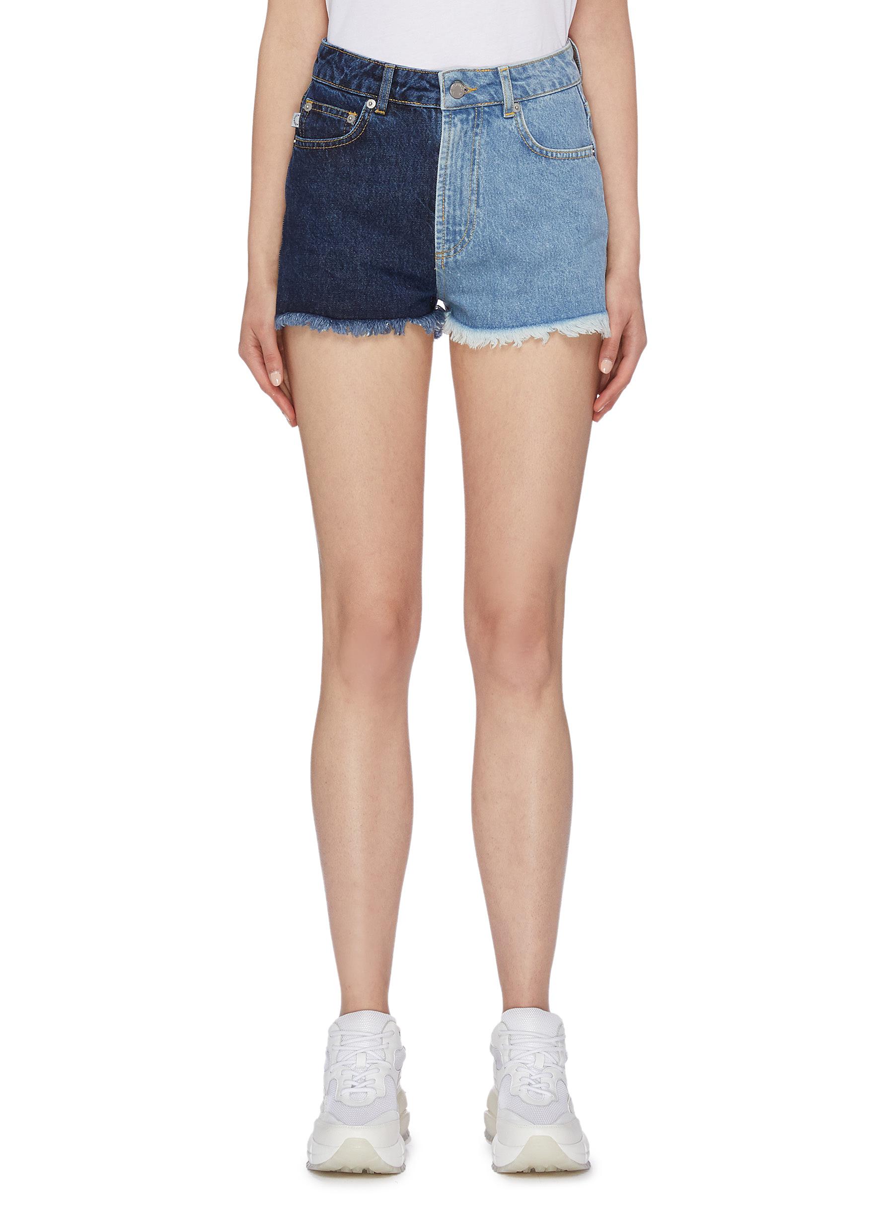 50/50 colourblock frayed cuff denim shorts by Fiorucci