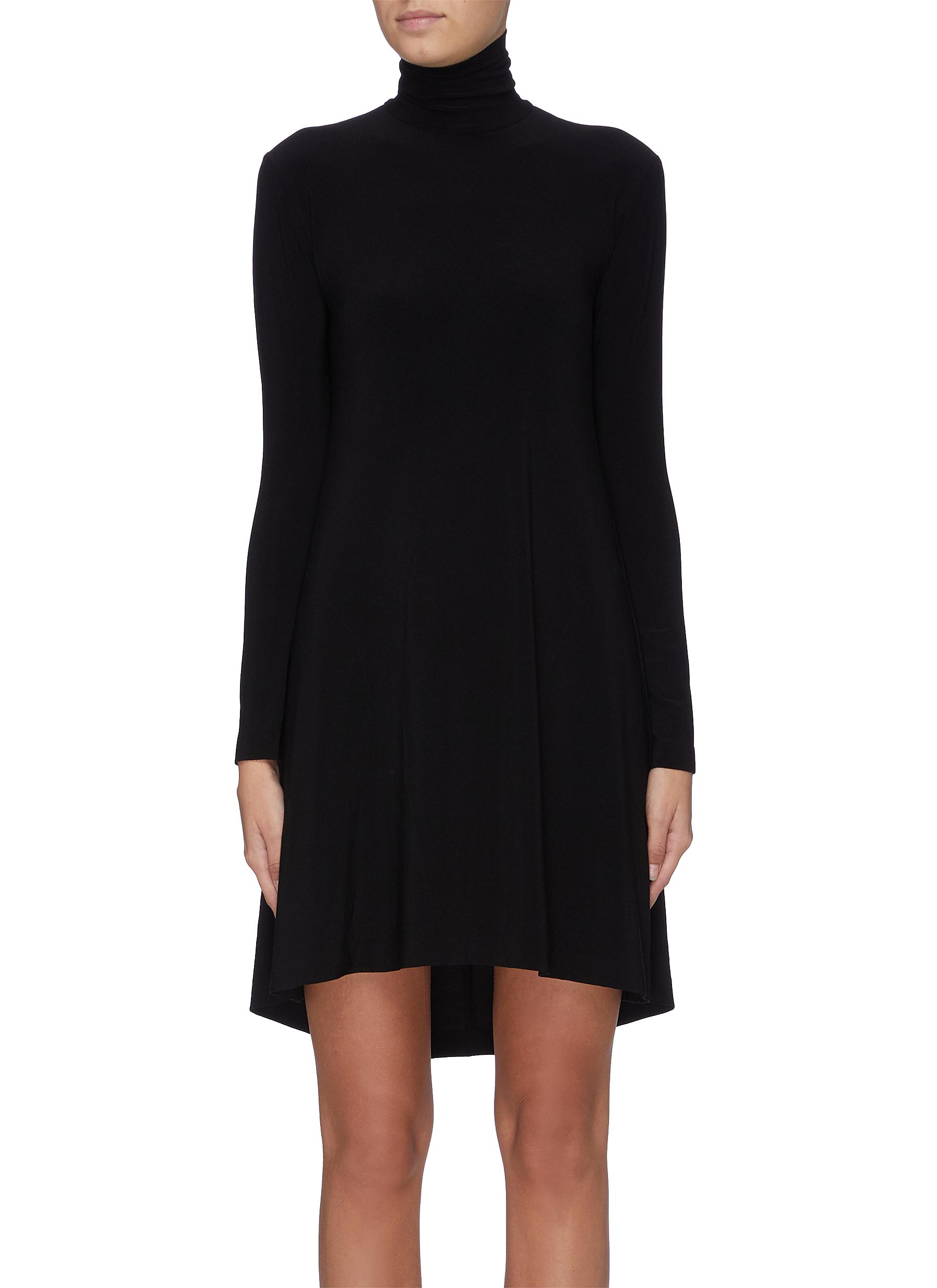 Long sleeve turtleneck dress by Norma Kamali