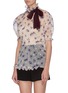 Front View - Click To Enlarge - MIU MIU - 'Nylonette' sheer floral puff sleeve top with a contrasting neck tie