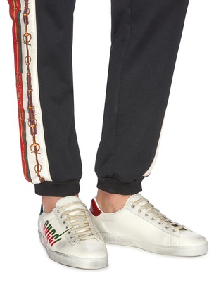 Figure View - Click To Enlarge - GUCCI - 'New Ace' logo print distressed leather sneakers