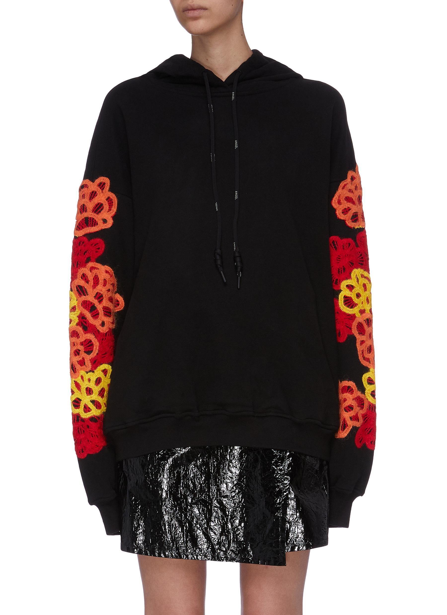 Floral appliqué sleeve hoodie by Angel Chen