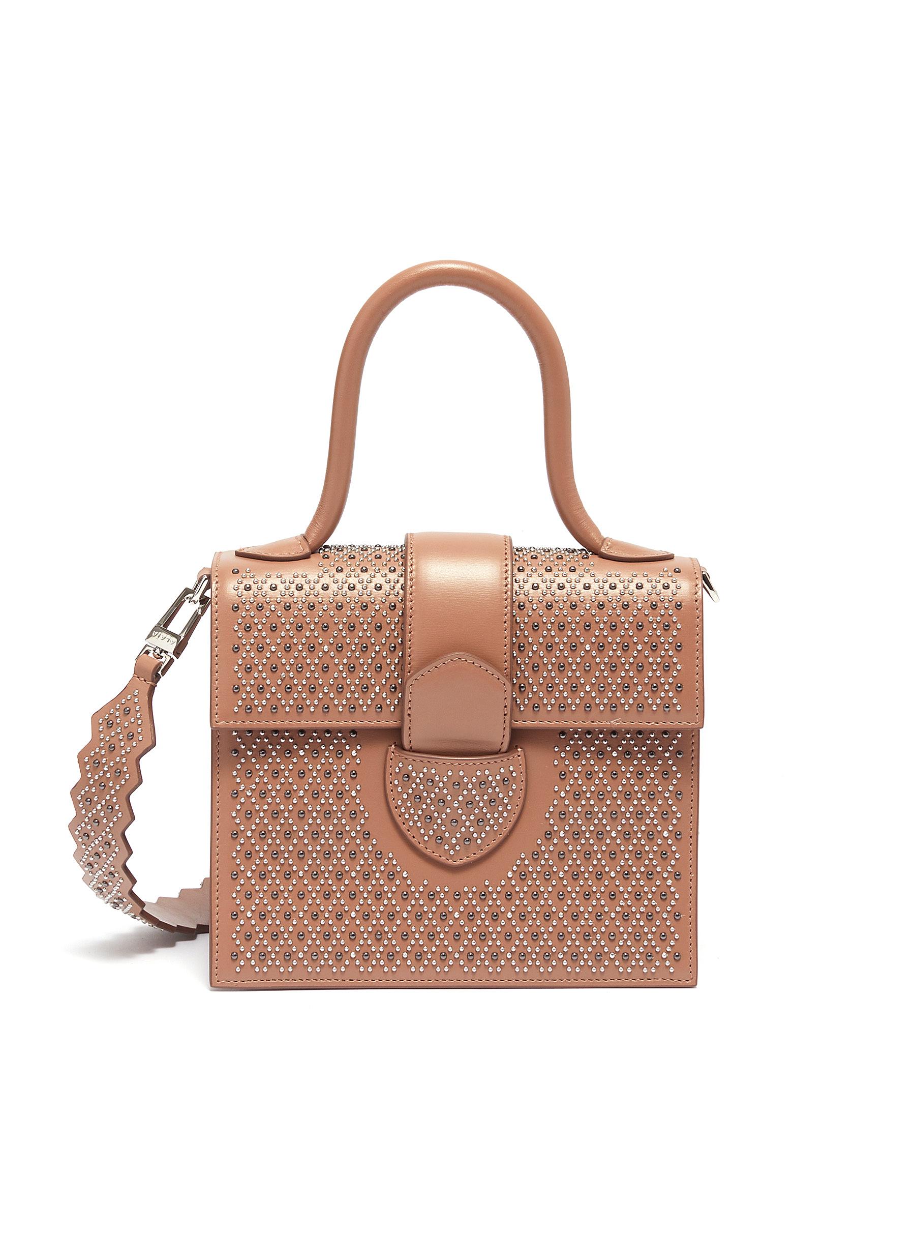 Click to view more detailed imagery on our partner's website AlaÏA 'Leonie' Stud Small Leather Shoulder Bag In Sahara