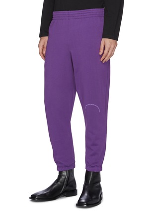 Front View - Click To Enlarge - MARTINE ROSE - Slogan print slim fit track pants