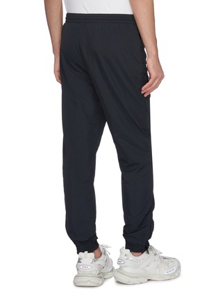 Back View - Click To Enlarge - VETEMENTS - 'Anarchy' logo print track pants