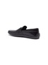  - TOD’S - 'Gomma' leather penny loafers
