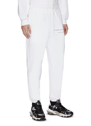 Detail View - Click To Enlarge - ALEXANDER WANG - x Lane Crawford 'Bling' logo embellished unisex jogging pants