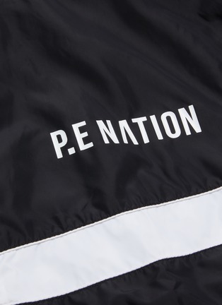  - P.E NATION - 'Dominion' reversible star print bomber jacket