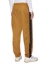 Back View - Click To Enlarge - ACNE STUDIOS - Face patch panel outseam nylon pants