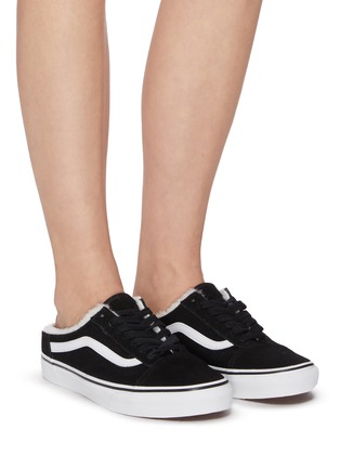 vans old skool mule on feet