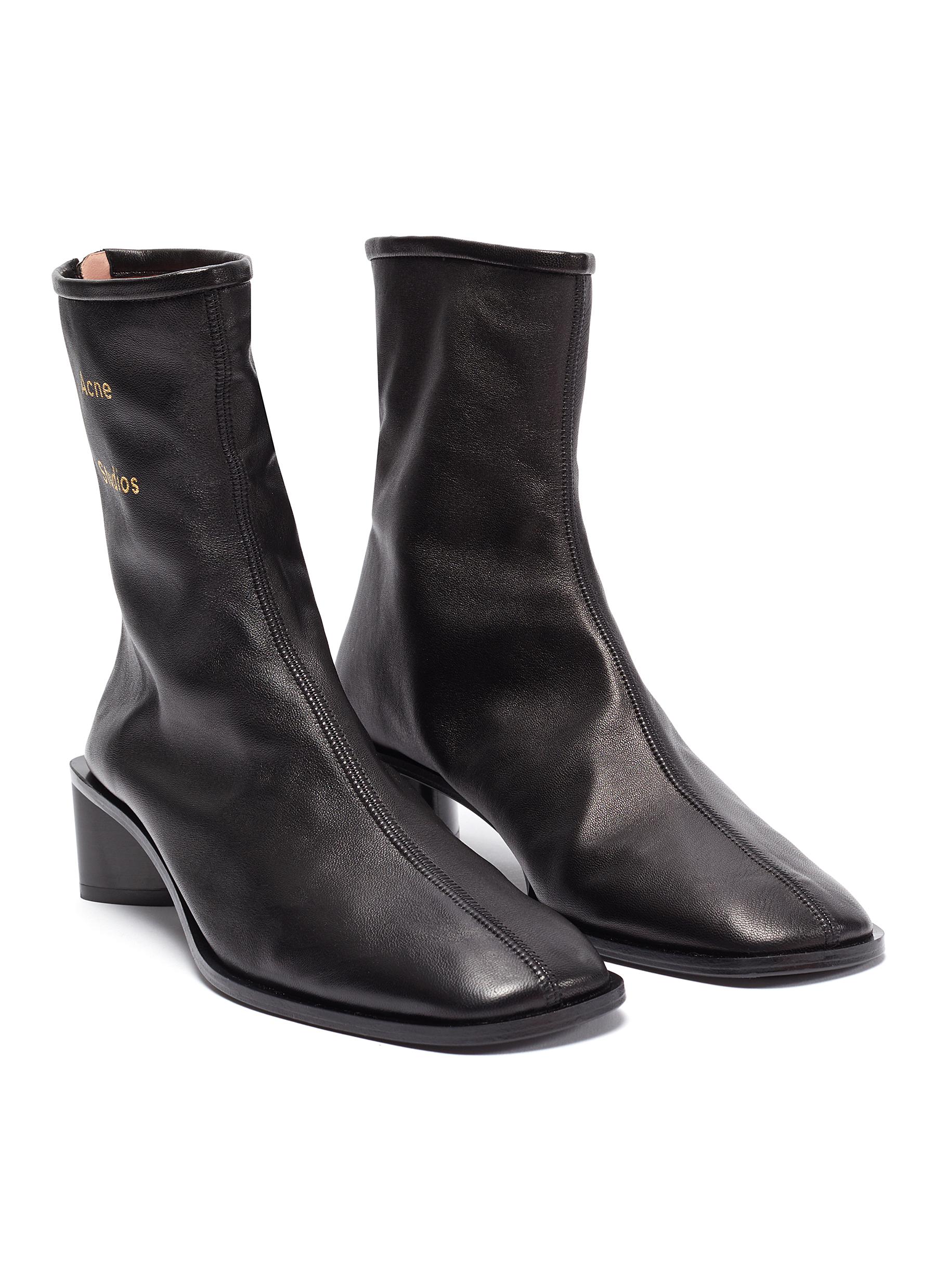 ACNE STUDIOS BLOCK HEEL BRANDED LEATHER BOOTS