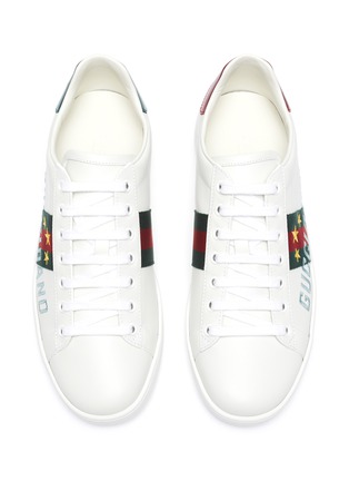 Detail View - Click To Enlarge - GUCCI - 'New Ace' slogan embroidered web stripe sneakers