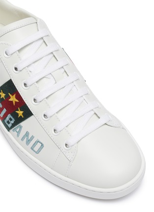 Detail View - Click To Enlarge - GUCCI - 'New Ace' slogan embroidered web stripe sneakers