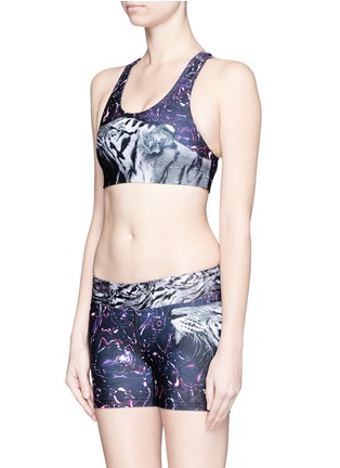 Front View - Click To Enlarge - WE ARE HANDSOME - 'Orion' print active cropped top