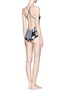 Front View - Click To Enlarge -  - Floral Discs cross back one-piece swimsuit