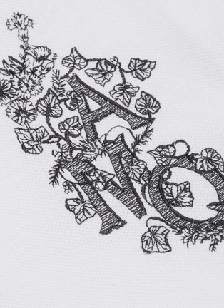  - ALEXANDER MCQUEEN - Floral logo embroidered polo shirt