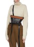 Figure View - Click To Enlarge - KHAORE - 'Baby Carrier' trapezoid crossbody bag