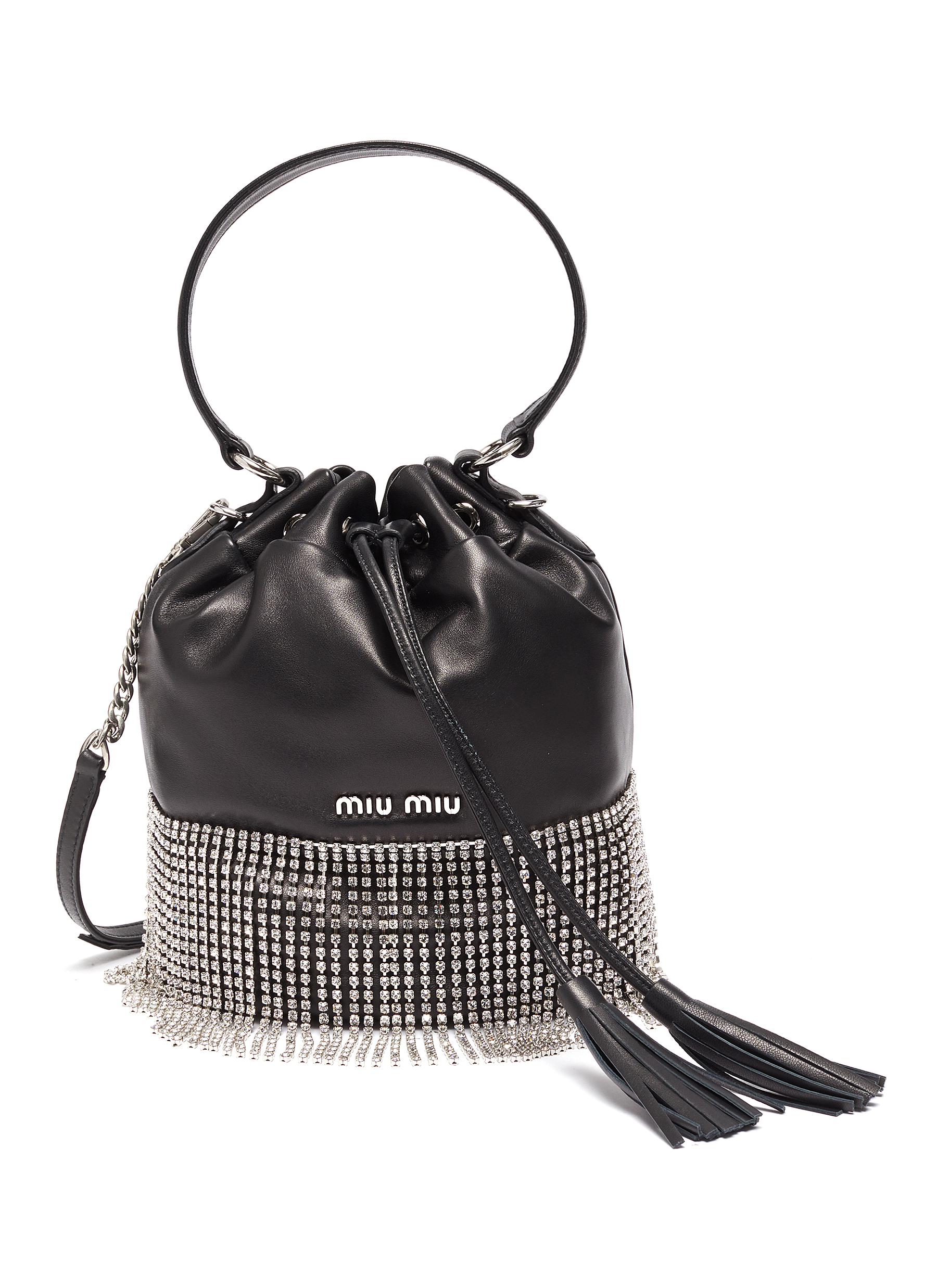leather bucket bag with tassels