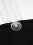  - BALMAIN - Metallic button embellished knit crop top