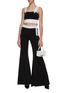 Figure View - Click To Enlarge - BALMAIN - Metallic button embellished knit flared pants