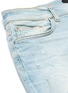  - AMIRI - Distressed watercolour skinny jeans