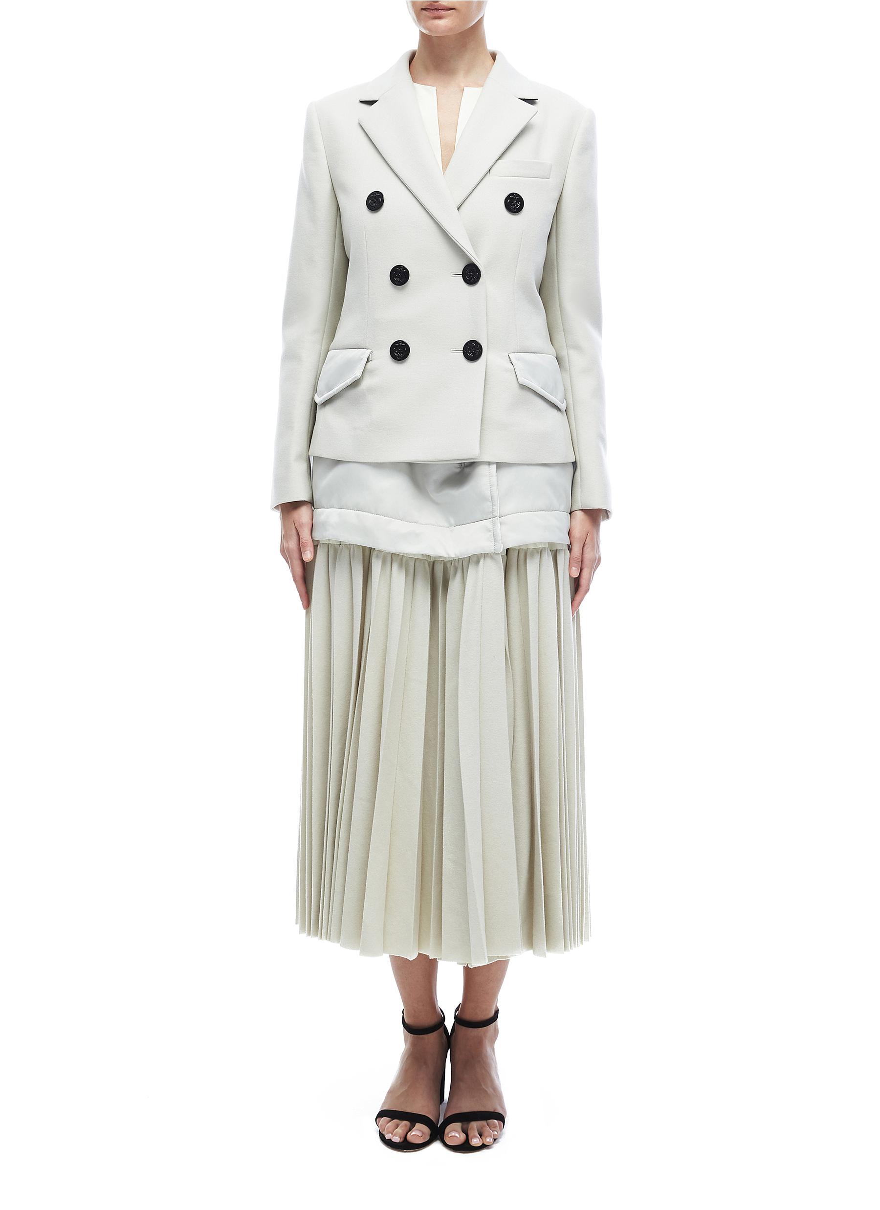 Pleated skirt clearance coat