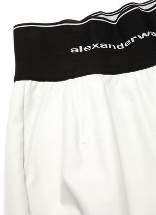  - ALEXANDER WANG - Logo print elastic waistband side zip carrot pants