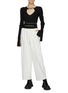 Figure View - Click To Enlarge - ALEXANDER WANG - Logo print elastic waistband side zip carrot pants