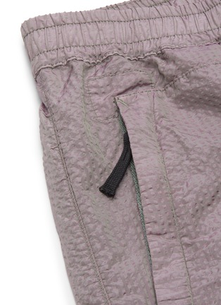  - STONE ISLAND - 'Poly-Colour Frame' iridescent cuffed pants