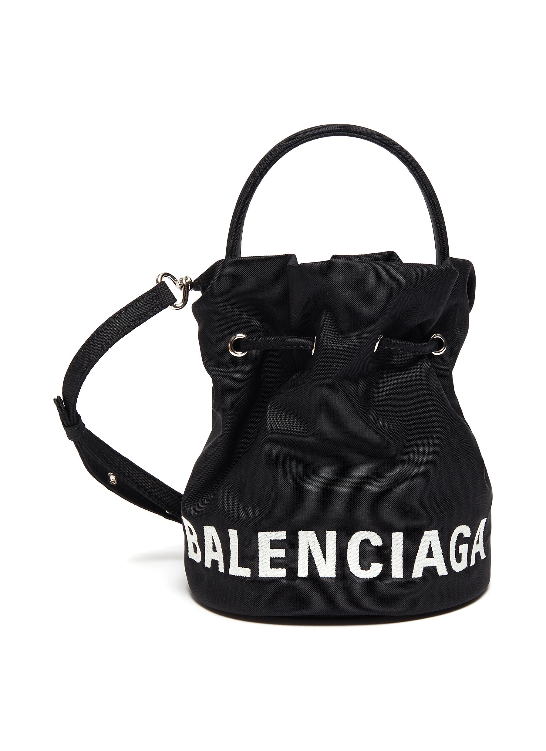 black drawstring bucket bag