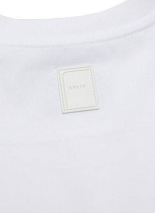  - SOLID HOMME - Logo print split hem cotton T-shirt