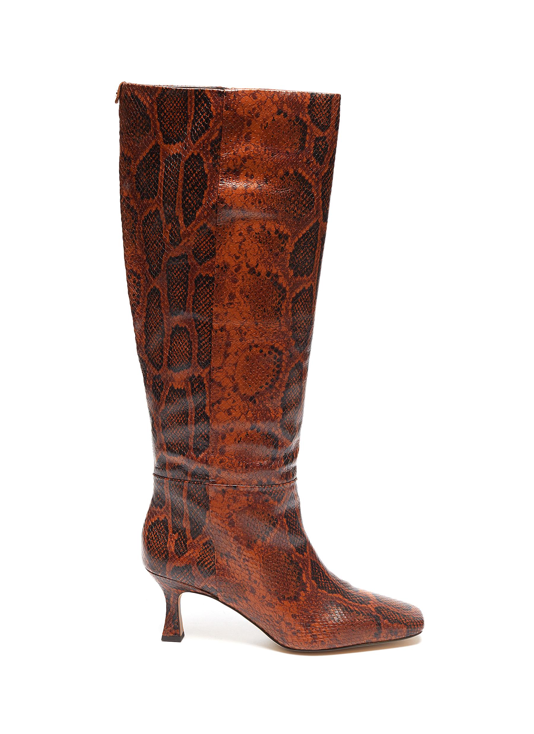 snake embossed boots