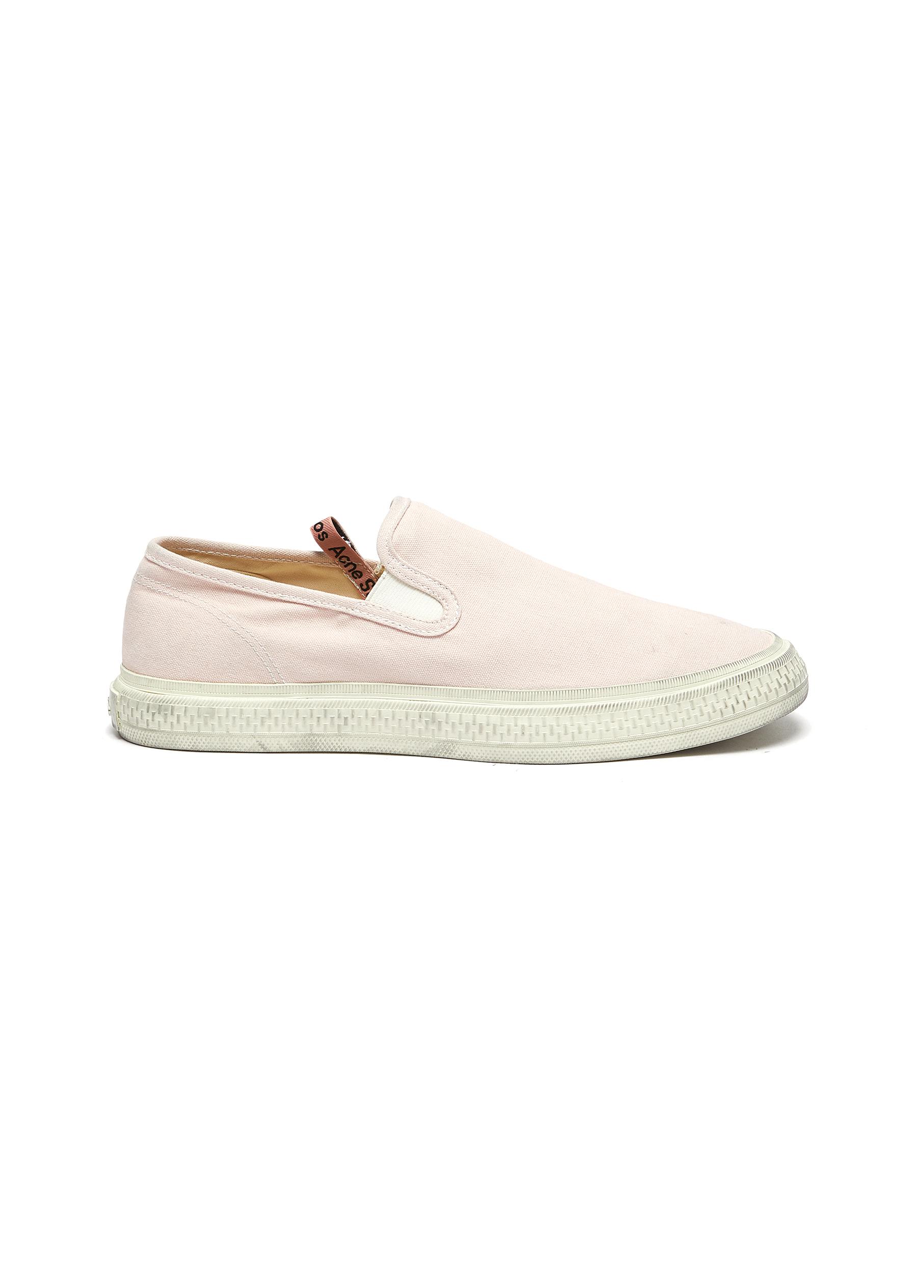 ACNE STUDIOS DISTRESSED DETAIL SLIP ON CANVAS SNEAKERS