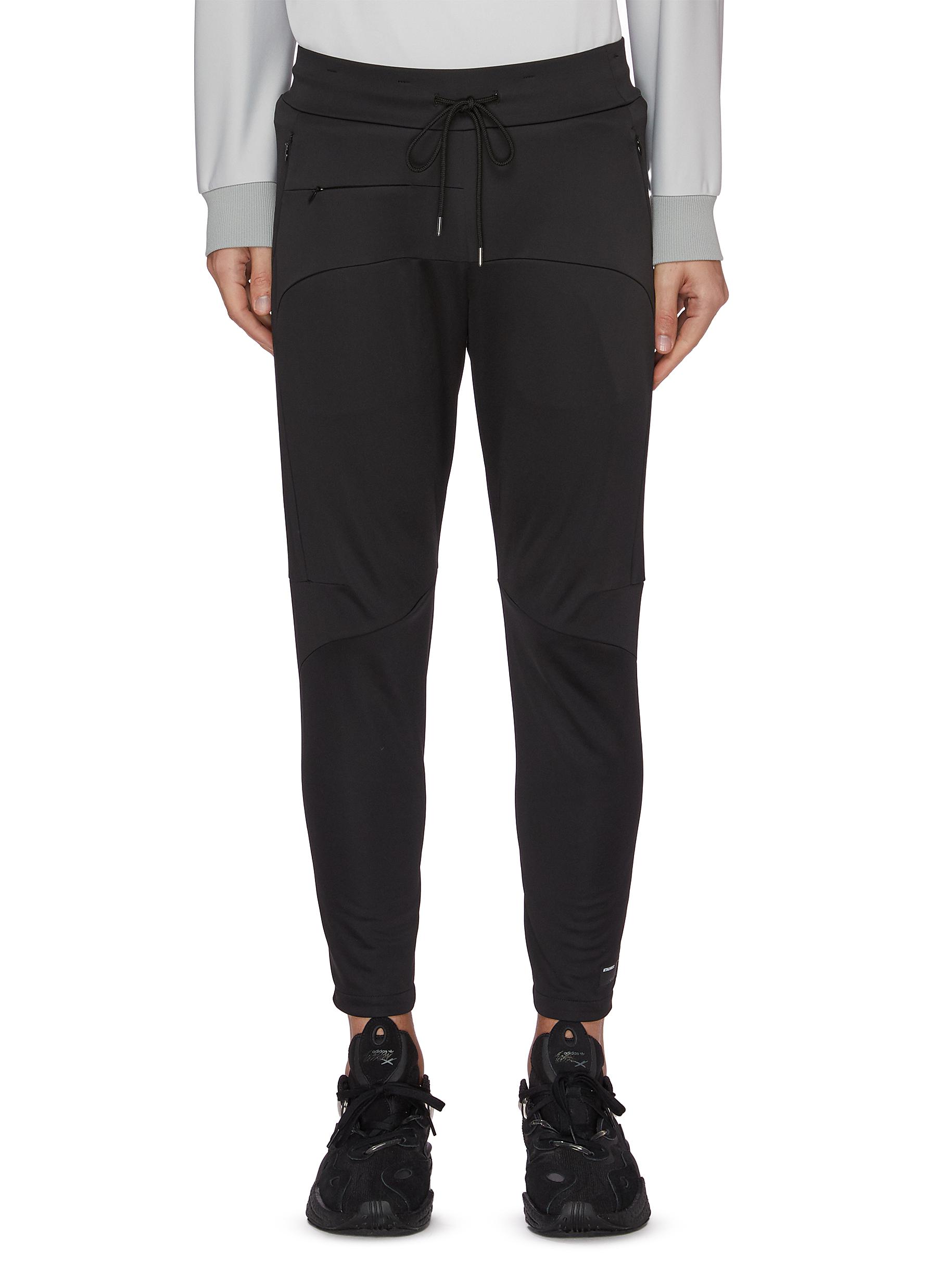 Click to view more detailed imagery on our partner's website Attachment Drawstring Zip Detail Sweatpants In Black